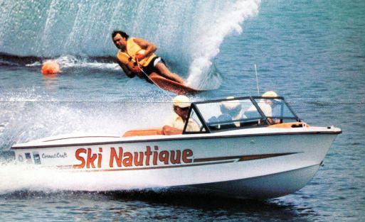 Waterskier being pulled by Ski Nautique boat