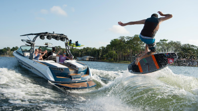 Nautique Boat pulling wakeboarder through water