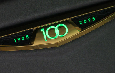 100 Year logo glowing green close up on 2025 Super Air Nautique G21 boat